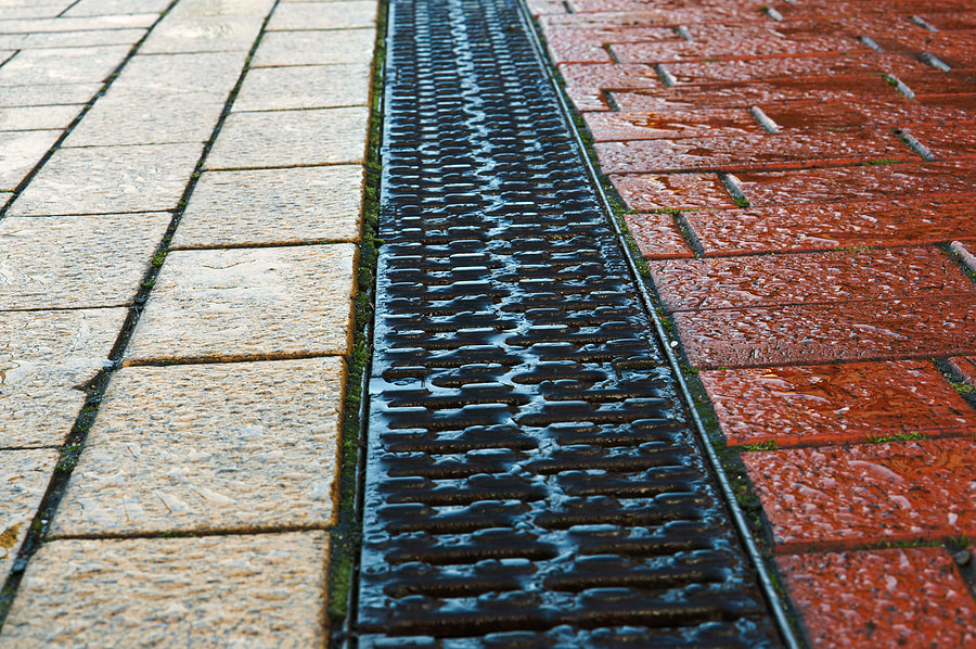 commercial drain on brick walkway